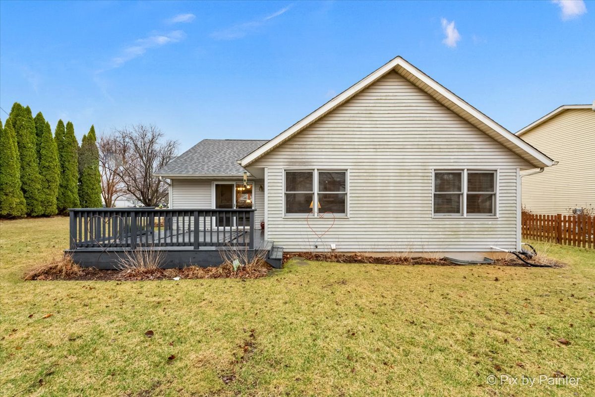 705 Cherry Tree Lane Genoa, IL 60135 - Photo 22 of 31 a view of a house with a yard