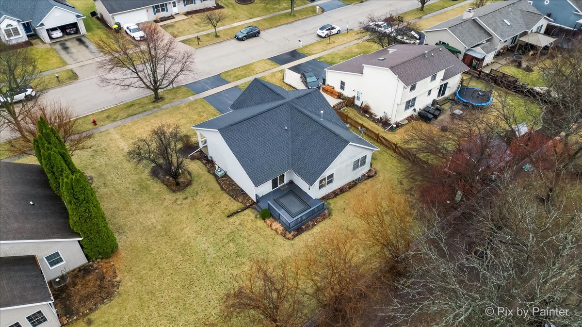 705 Cherry Tree Lane Genoa, IL 60135 - Photo 29 of 31 an aerial view of a house with a yard