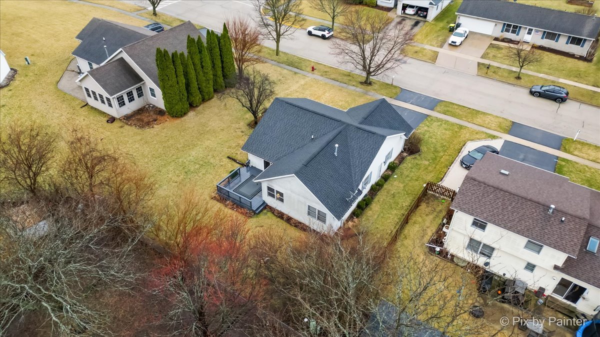 705 Cherry Tree Lane Genoa, IL 60135 - Photo 30 of 31 an aerial view of residential house with swimming pool