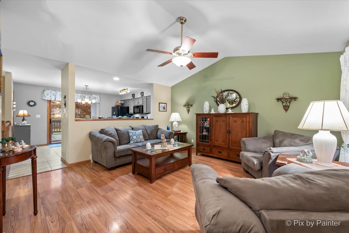 705 Cherry Tree Lane Genoa, IL 60135 - Photo 4 of 31 a living room with furniture