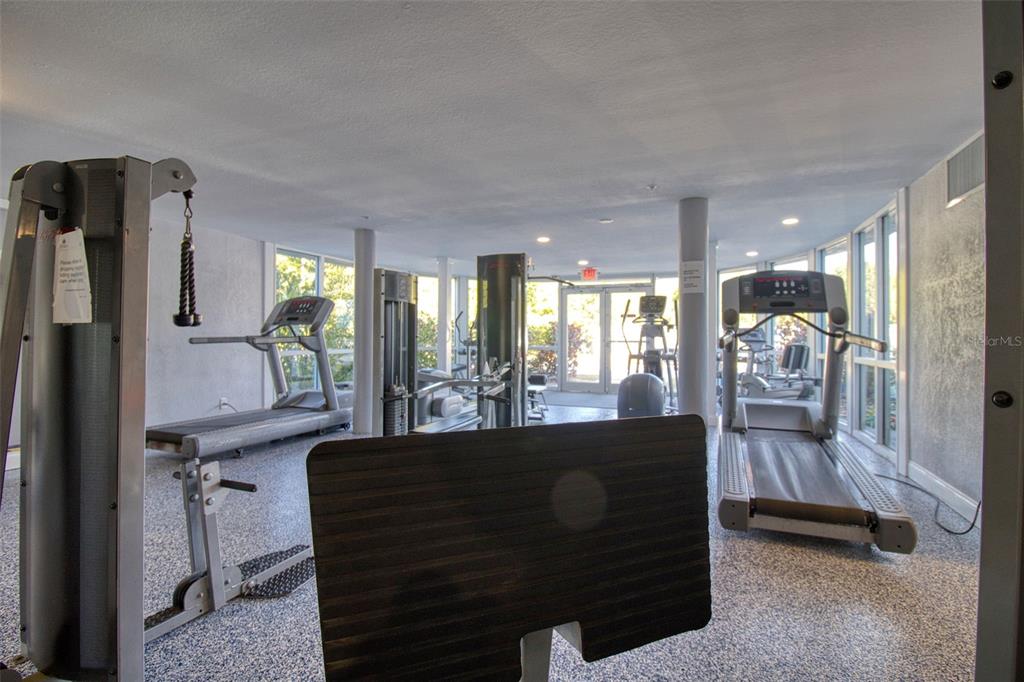 3315 58th Avenue South, Unit 112 St. Petersburg, FL 33712 - Photo 18 of 38 a living room with furniture and a large window