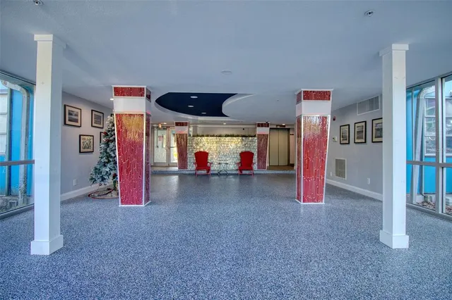 a living room filled with furniture and gym equipment
