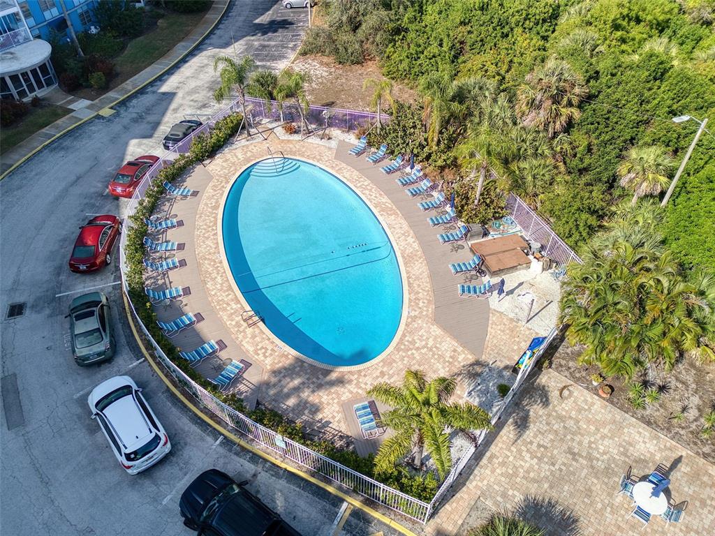 3315 58th Avenue South, Unit 112 St. Petersburg, FL 33712 - Photo 26 of 38 an aerial view of a swimming pool