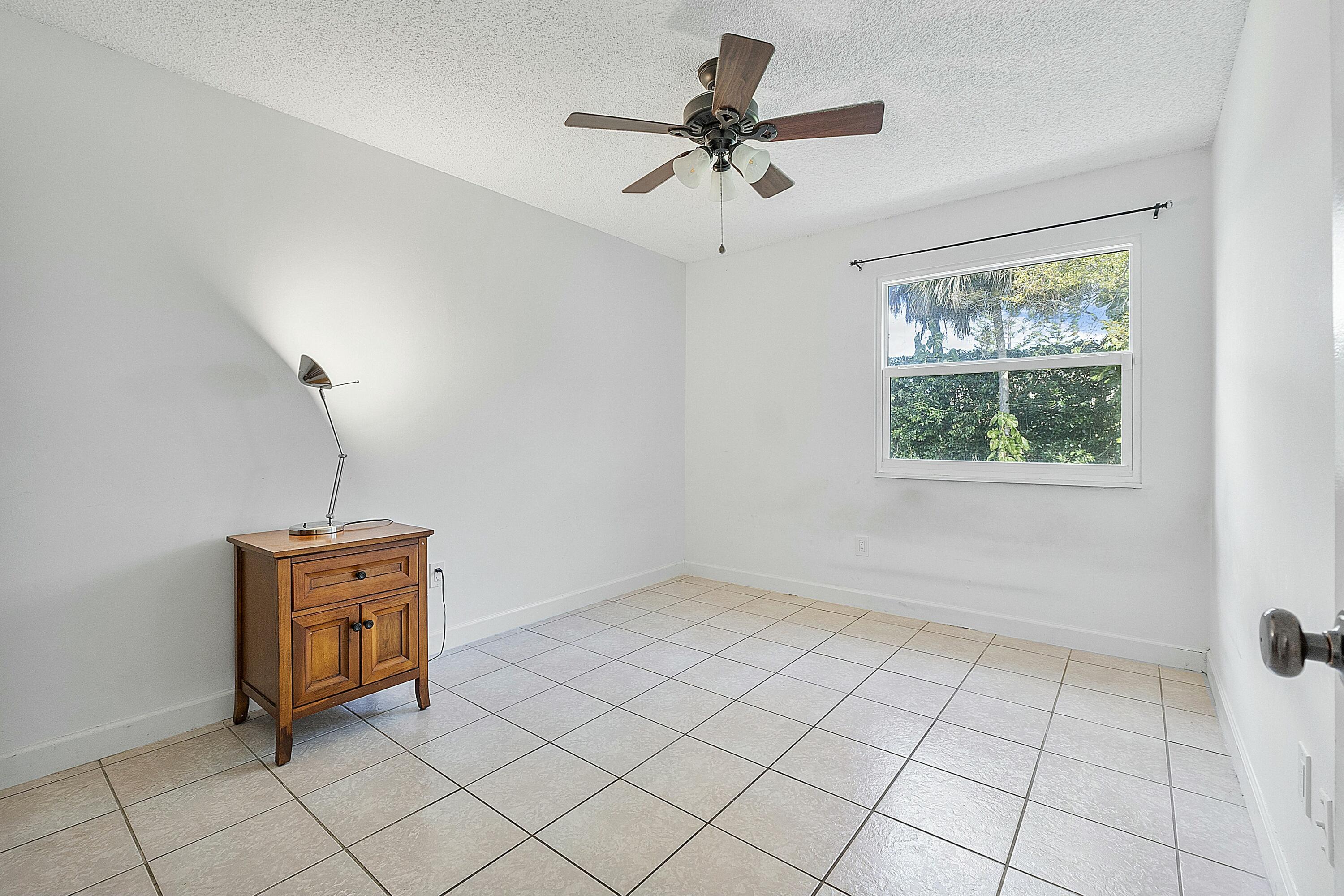 8143 Cedar Hollow Lane Boca Raton, FL 33433 - Photo 23 of 29 a living room with furniture