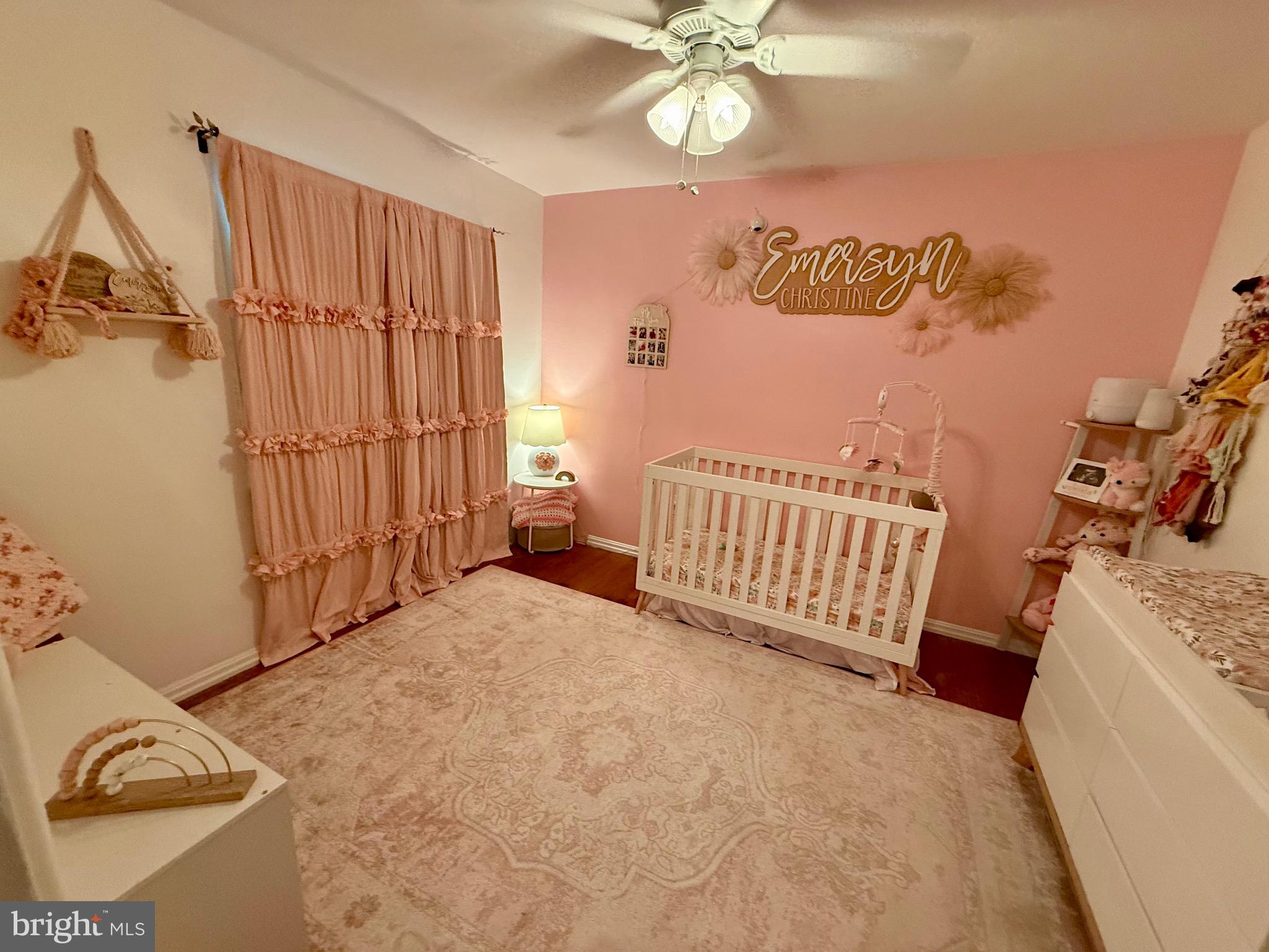 1294 Warwick Road Camp Hill, PA 17011 - Photo 11 of 27 a view of a livingroom with furniture and a ceiling fan