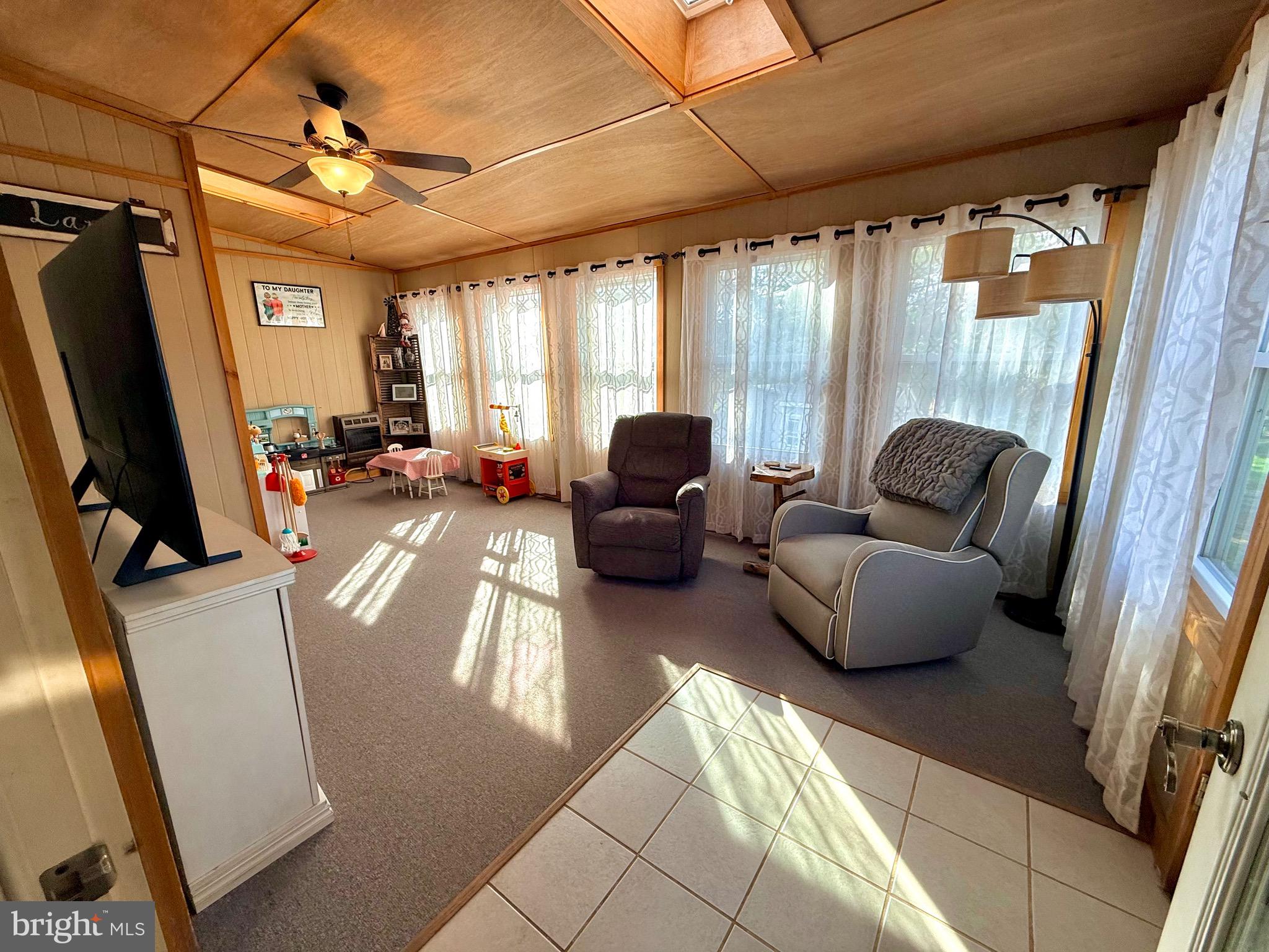 1294 Warwick Road Camp Hill, PA 17011 - Photo 18 of 27 a living room with furniture and a flat screen tv