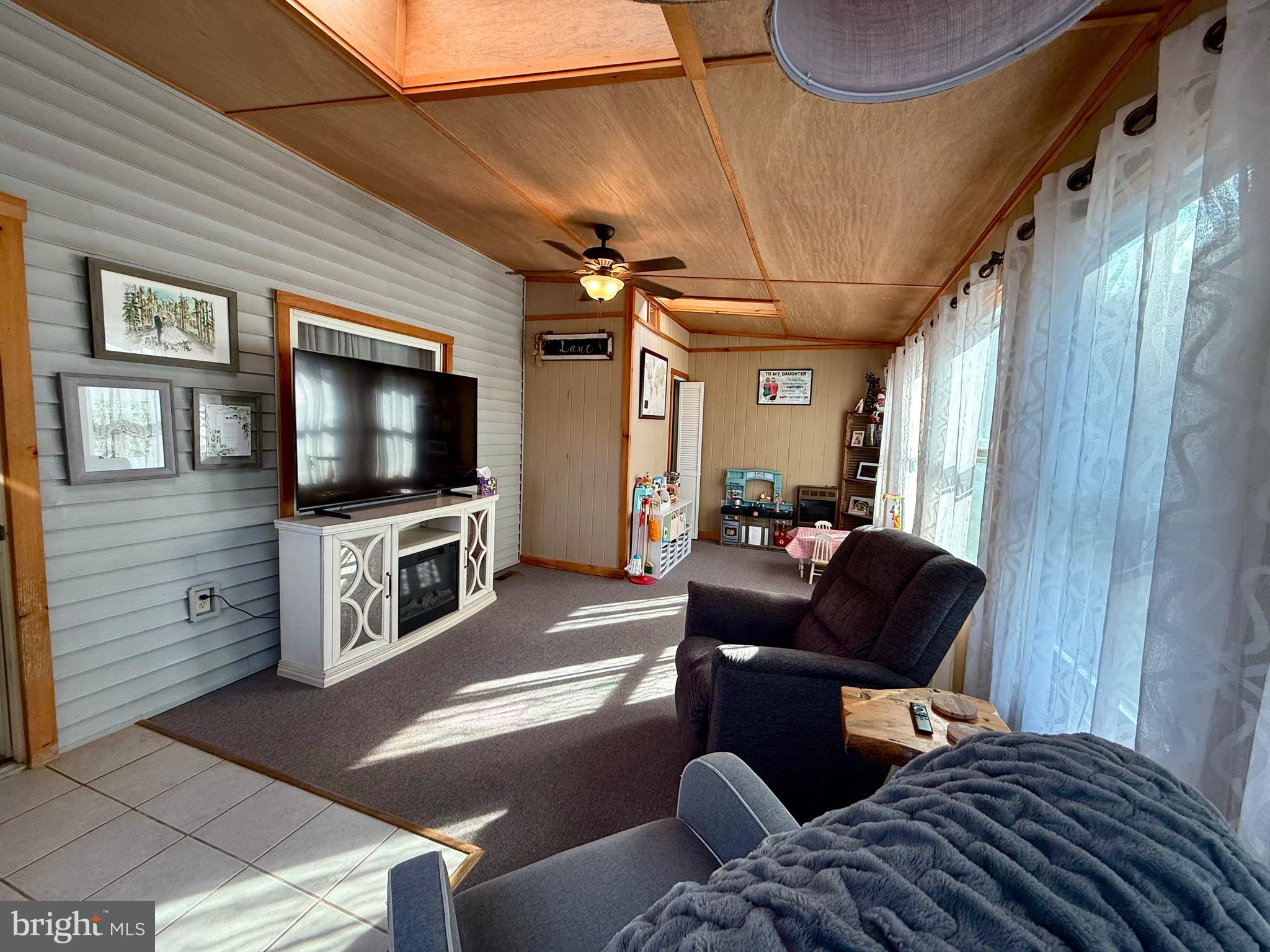 1294 Warwick Road Camp Hill, PA 17011 - Photo 19 of 27 a living room with furniture and a flat screen tv
