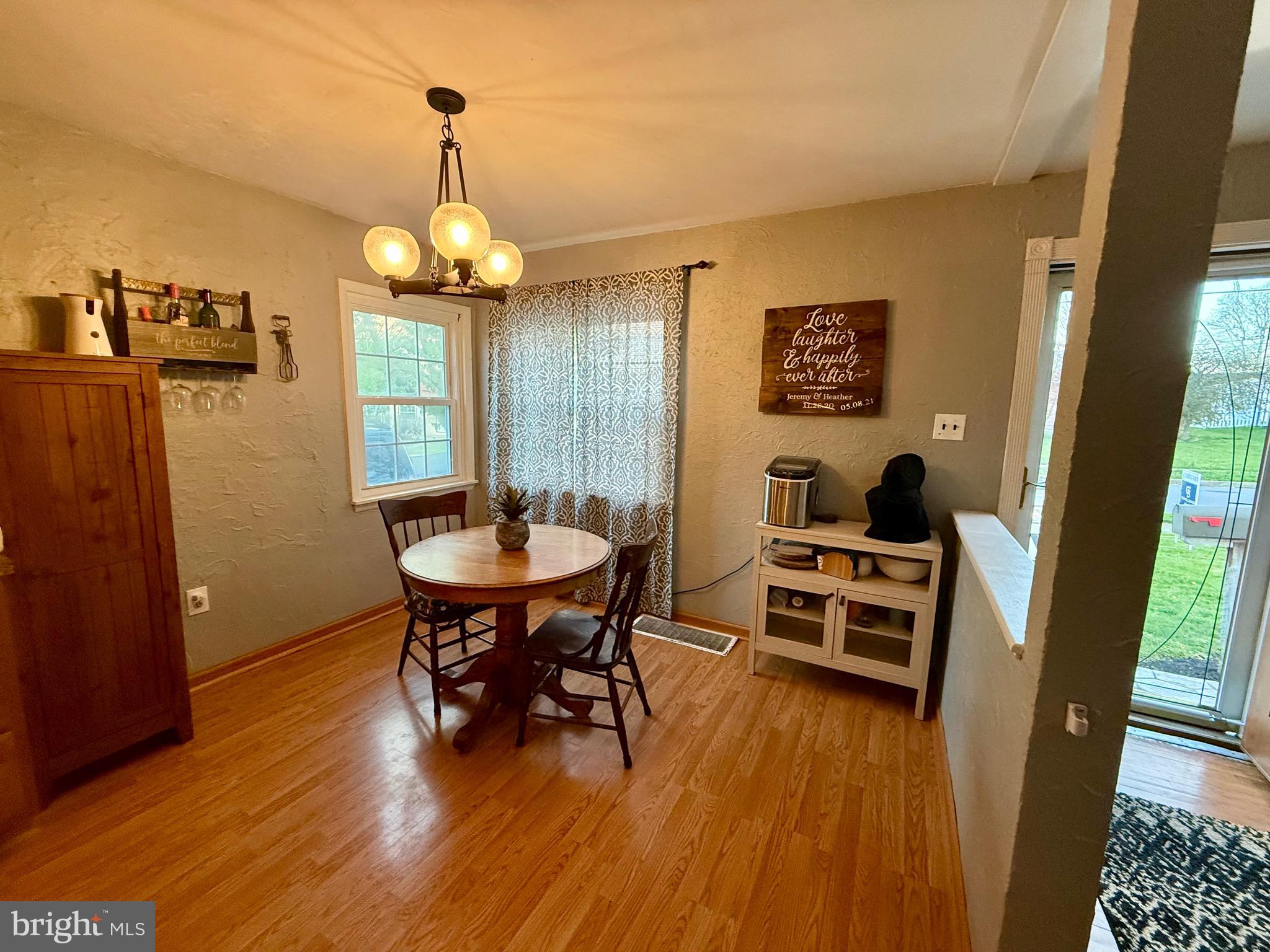 1294 Warwick Road Camp Hill, PA 17011 - Photo 6 of 27 a view of a dining room with furniture window and wooden floor