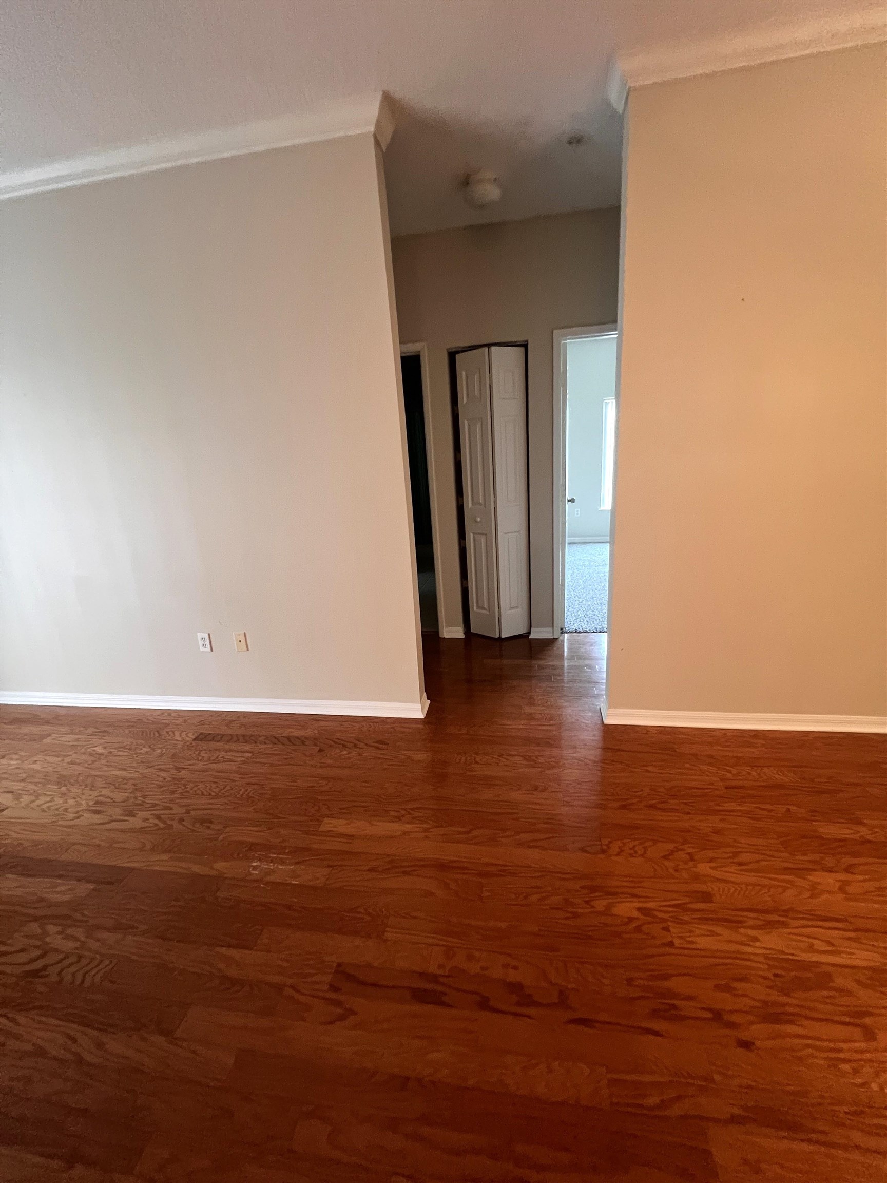 520 Florida Club Boulevard, Unit 212 St. Augustine, FL 32084 - Photo 12 of 28 a view of an empty room with wooden floor and a window