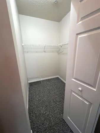 view of a room with racks on the wall