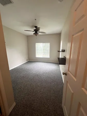 a view of livingroom with window and a fireplace