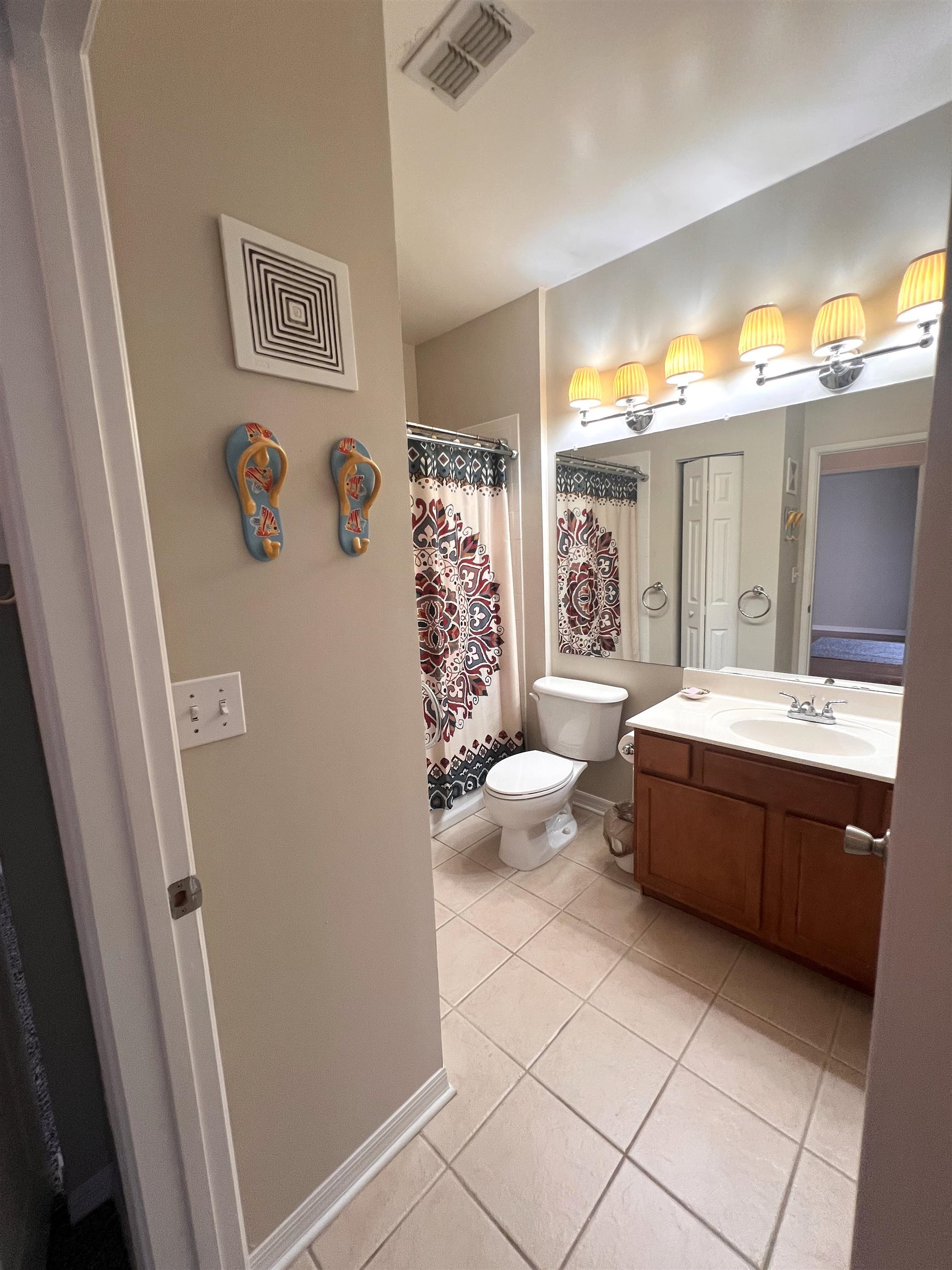 520 Florida Club Boulevard, Unit 212 St. Augustine, FL 32084 - Photo 16 of 28 a spacious bathroom with a bathtub sink and toilet