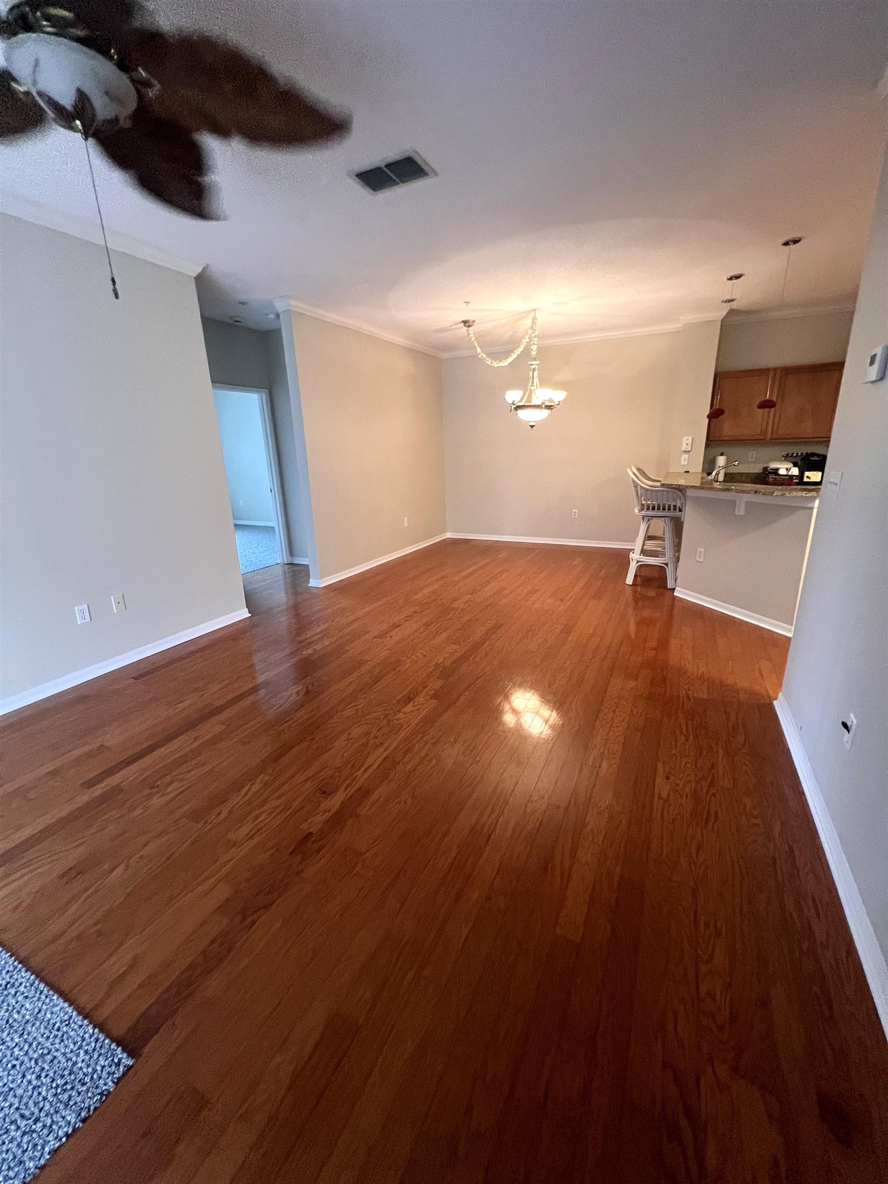 520 Florida Club Boulevard, Unit 212 St. Augustine, FL 32084 - Photo 17 of 28 a view of a room with wooden floor