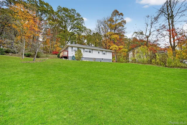 a house with a tree in front of it