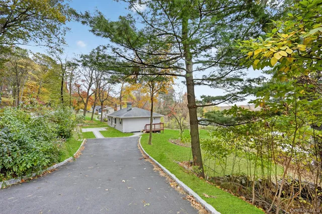 a view of a pathway with a park