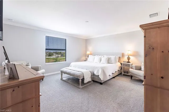 a bathroom with double sink and a mirror