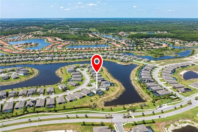 a sign that is in front of flowers