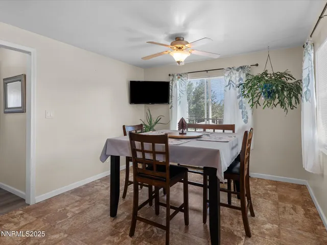 a view of a lush green outdoor space with a lake view
