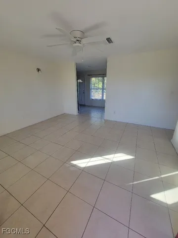a view of a hallway with a window