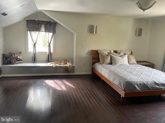 a bathroom with a tub and shower