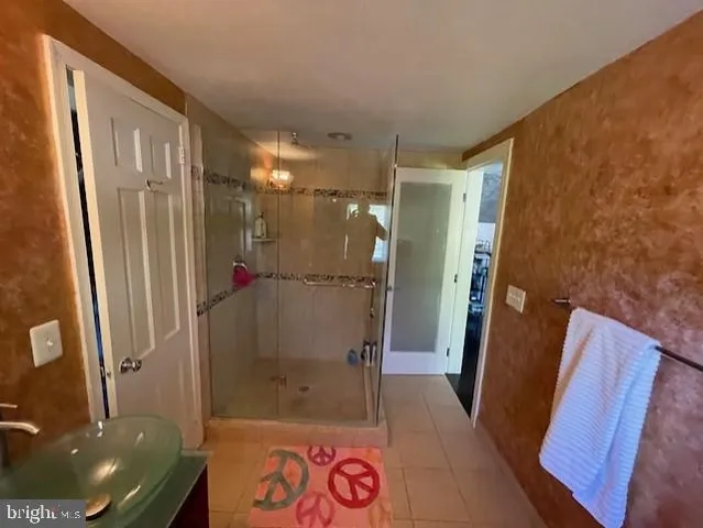 a view of a hallway with seating area