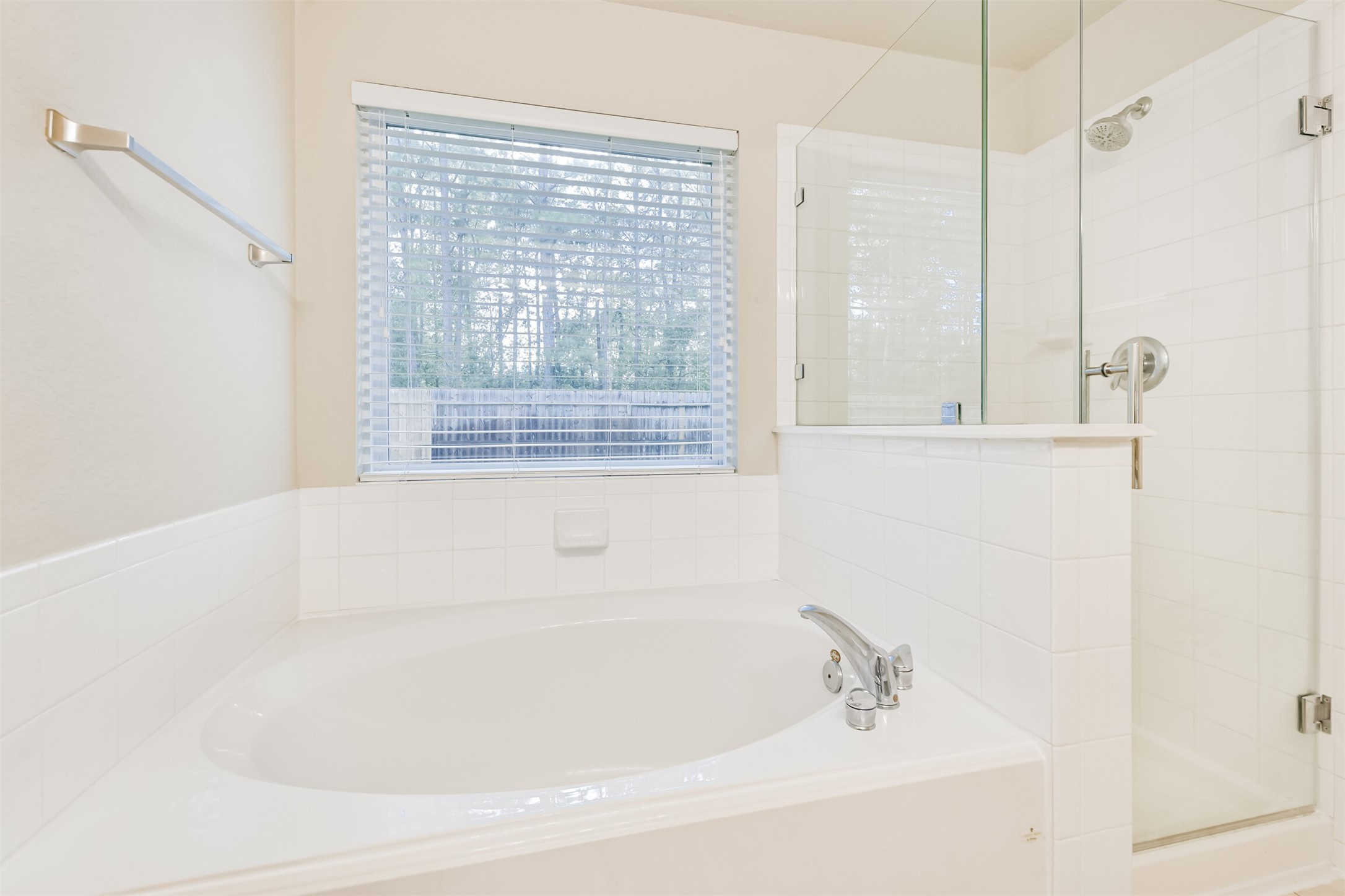 42 Prairie Oak Drive Conroe, TX 77385 - Photo 21 of 33 a white bath tub sitting next to a shower