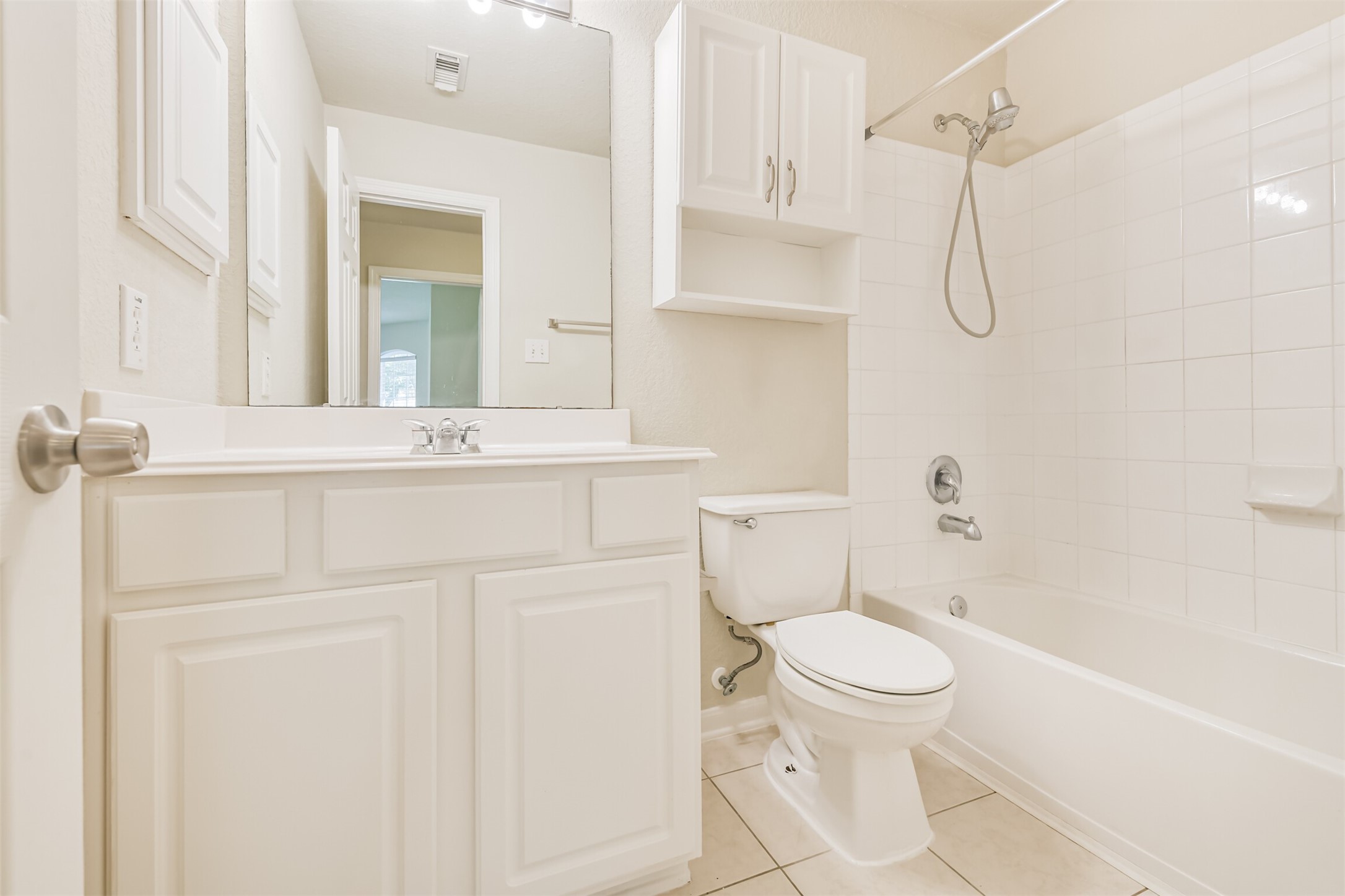 42 Prairie Oak Drive Conroe, TX 77385 - Photo 25 of 33 a bathroom with a sink a toilet and shower