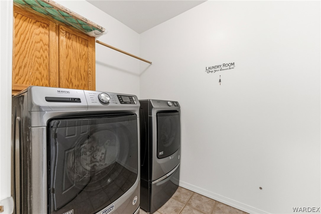 9332 Branded Road Kingman, AZ 86401 - Photo 25 of 44 a utility room with dryer and washer