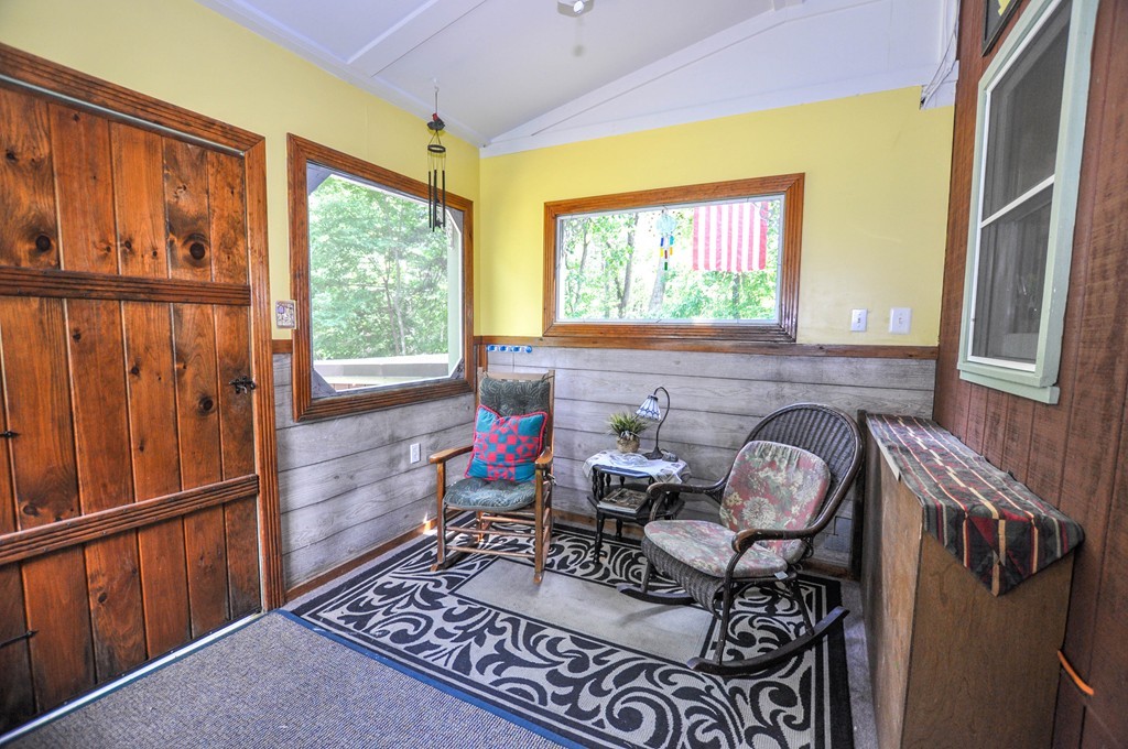 3 South Row Road Lunenburg, MA 01462 - Photo 15 of 29 a living room with furniture a window and a fireplace
