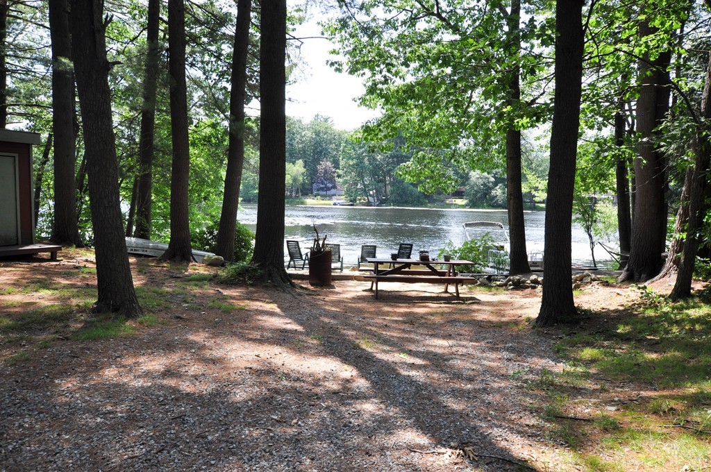 3 South Row Road Lunenburg, MA 01462 - Photo 23 of 29 a view of a lake with trees and houses in the back