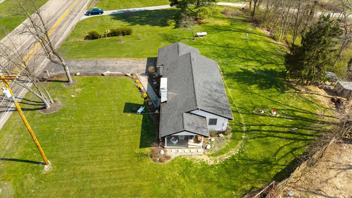 9555 Clyo Road Dayton, OH 45458 - Photo 28 of 31 This property features a well-maintained exterior and a lush green lawn.