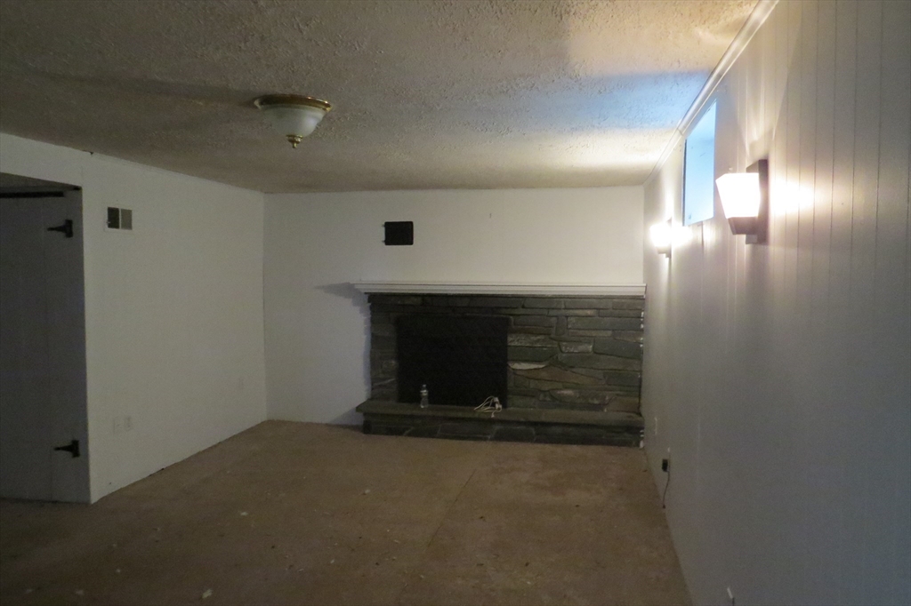 33 Coughlin Road Easton, MA 02356 - Photo 12 of 15 a view of empty room with wooden floor