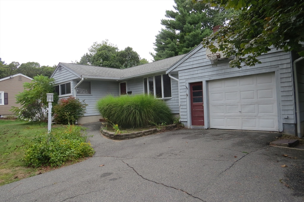 33 Coughlin Road Easton, MA 02356 - Photo 15 of 15 a view of a house with a yard and garage