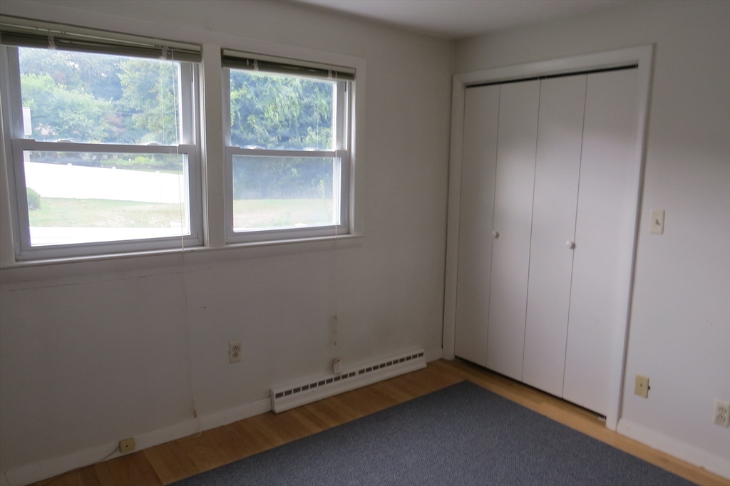33 Coughlin Road Easton, MA 02356 - Photo 8 of 15 an empty room with a window