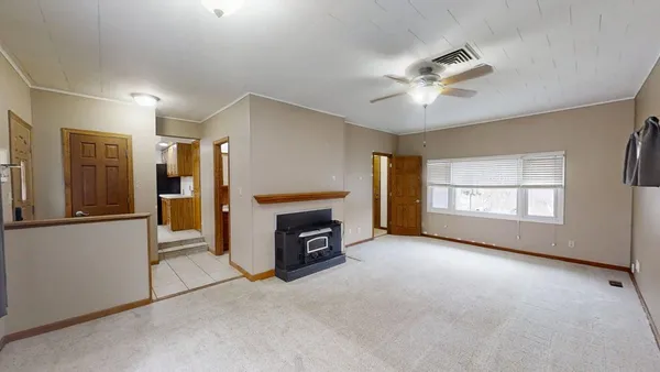 a view of a livingroom with a fireplace