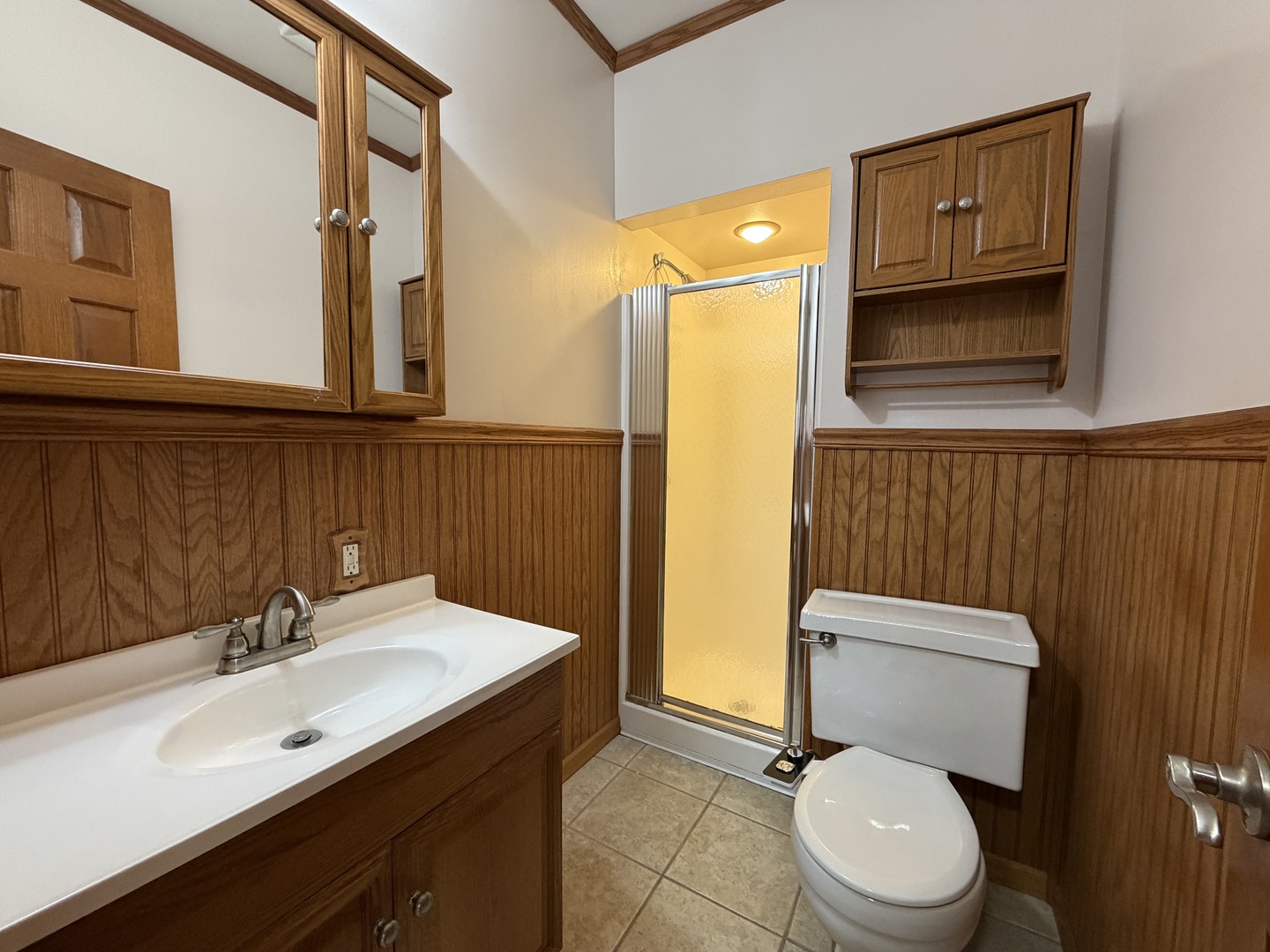 605 Douglas Street Catlin, IL 61817 - Photo 18 of 41 a bathroom with a sink a toilet and shower