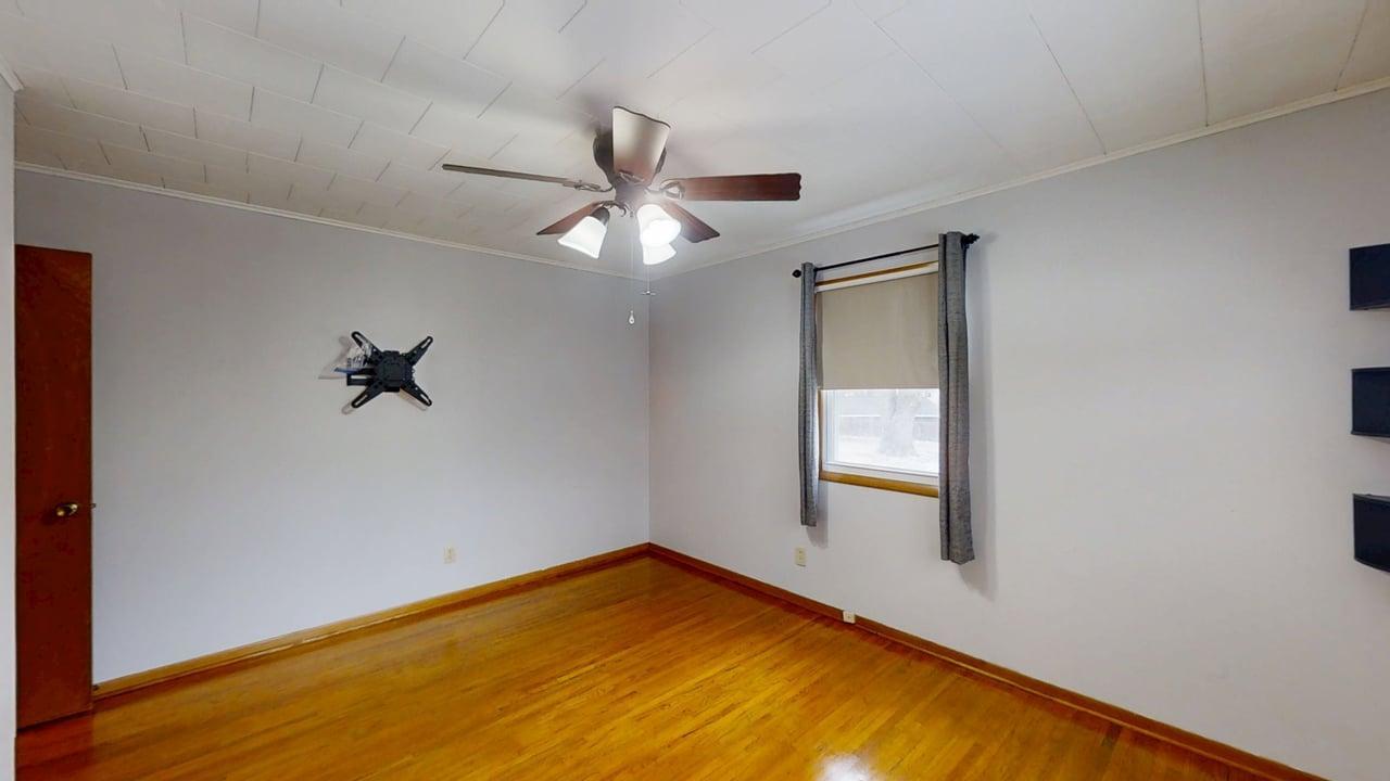 605 Douglas Street Catlin, IL 61817 - Photo 22 of 41 wooden floor in an empty room with a window