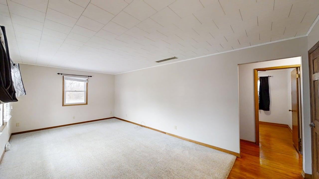 605 Douglas Street Catlin, IL 61817 - Photo 4 of 41 an empty room with windows