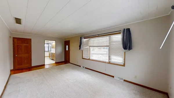 an empty room with a window
