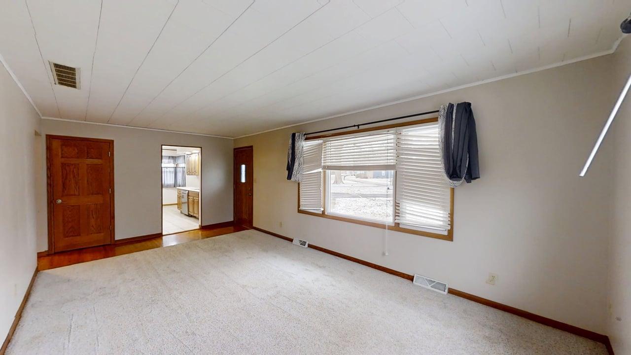605 Douglas Street Catlin, IL 61817 - Photo 5 of 41 an empty room with windows