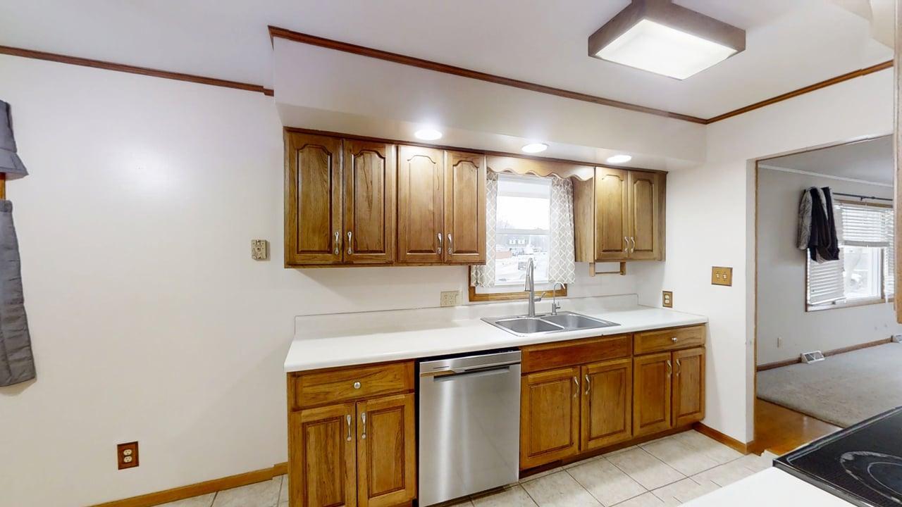 605 Douglas Street Catlin, IL 61817 - Photo 9 of 41 a bathroom with a sink and a mirror