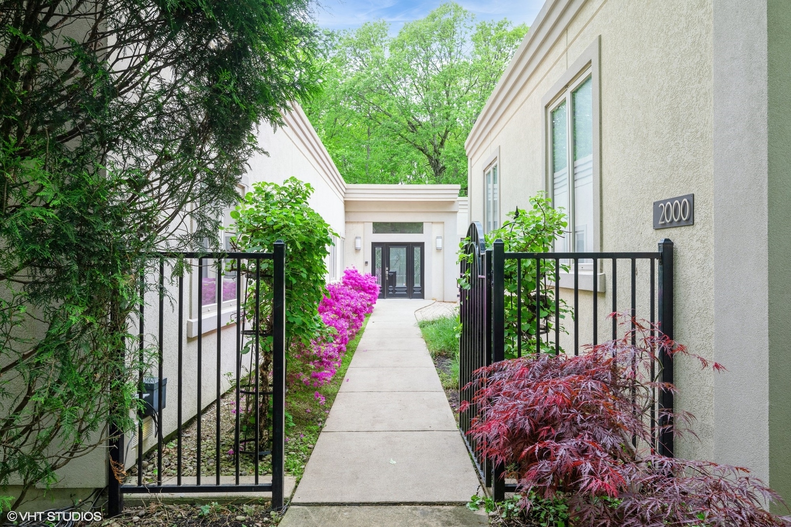 2000 Clendenin Lane Riverwoods, IL 60015 - Photo 1 of 51 a view of a pathway with a house in the background
