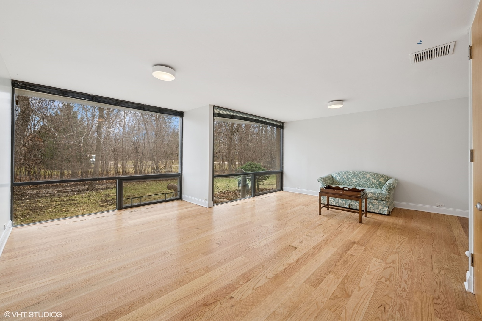 2000 Clendenin Lane Riverwoods, IL 60015 - Photo 25 of 51 a bench sitting in middle of a room
