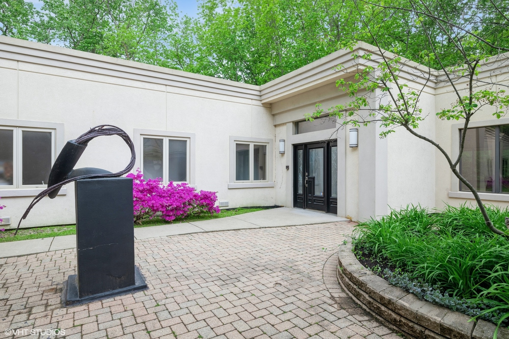 2000 Clendenin Lane Riverwoods, IL 60015 - Photo 3 of 51 a front view of a house with yard