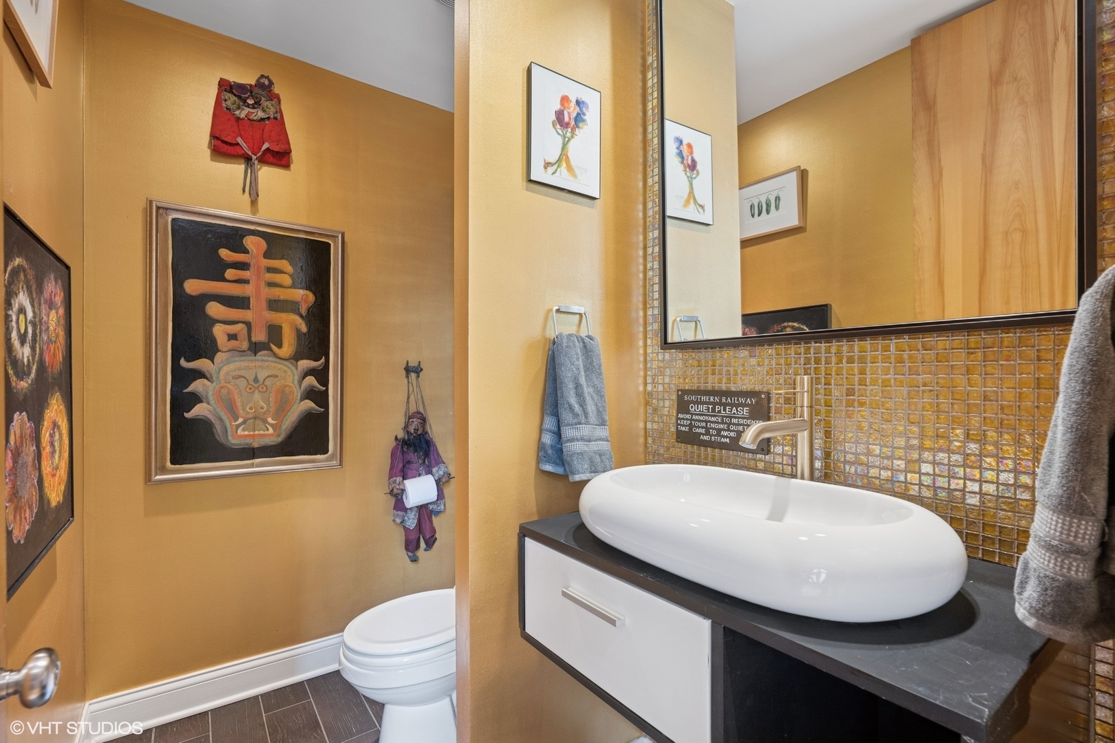 2000 Clendenin Lane Riverwoods, IL 60015 - Photo 40 of 51 a bathroom with a sink a toilet and a mirror