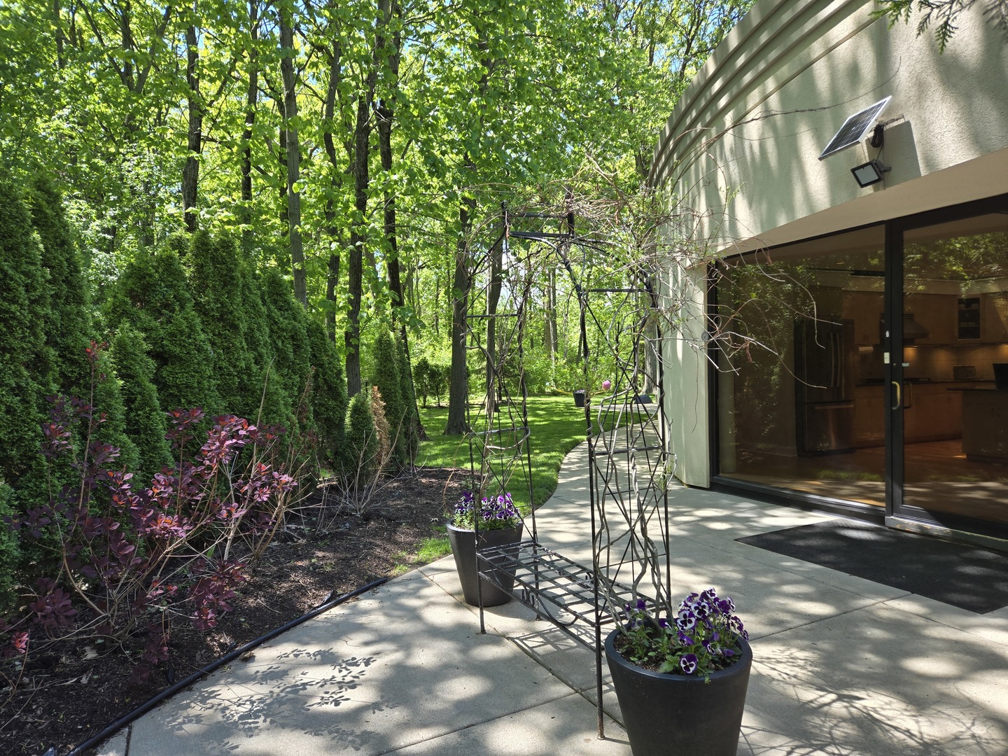 2000 Clendenin Lane Riverwoods, IL 60015 - Photo 46 of 51 a view of a patio with table and chairs and potted plants