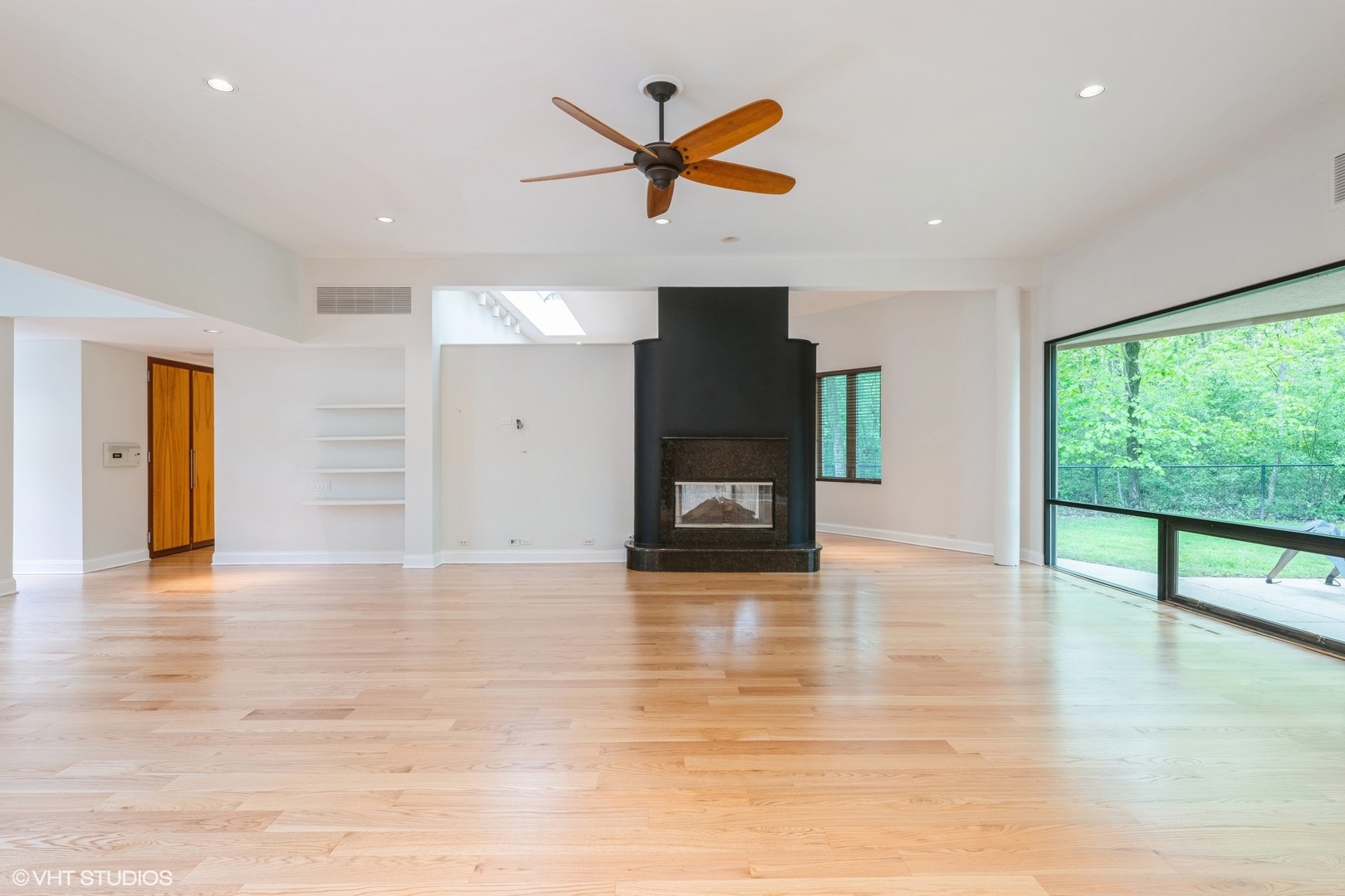 2000 Clendenin Lane Riverwoods, IL 60015 - Photo 7 of 51 a view of livingroom with hardwood floor and a ceiling fan