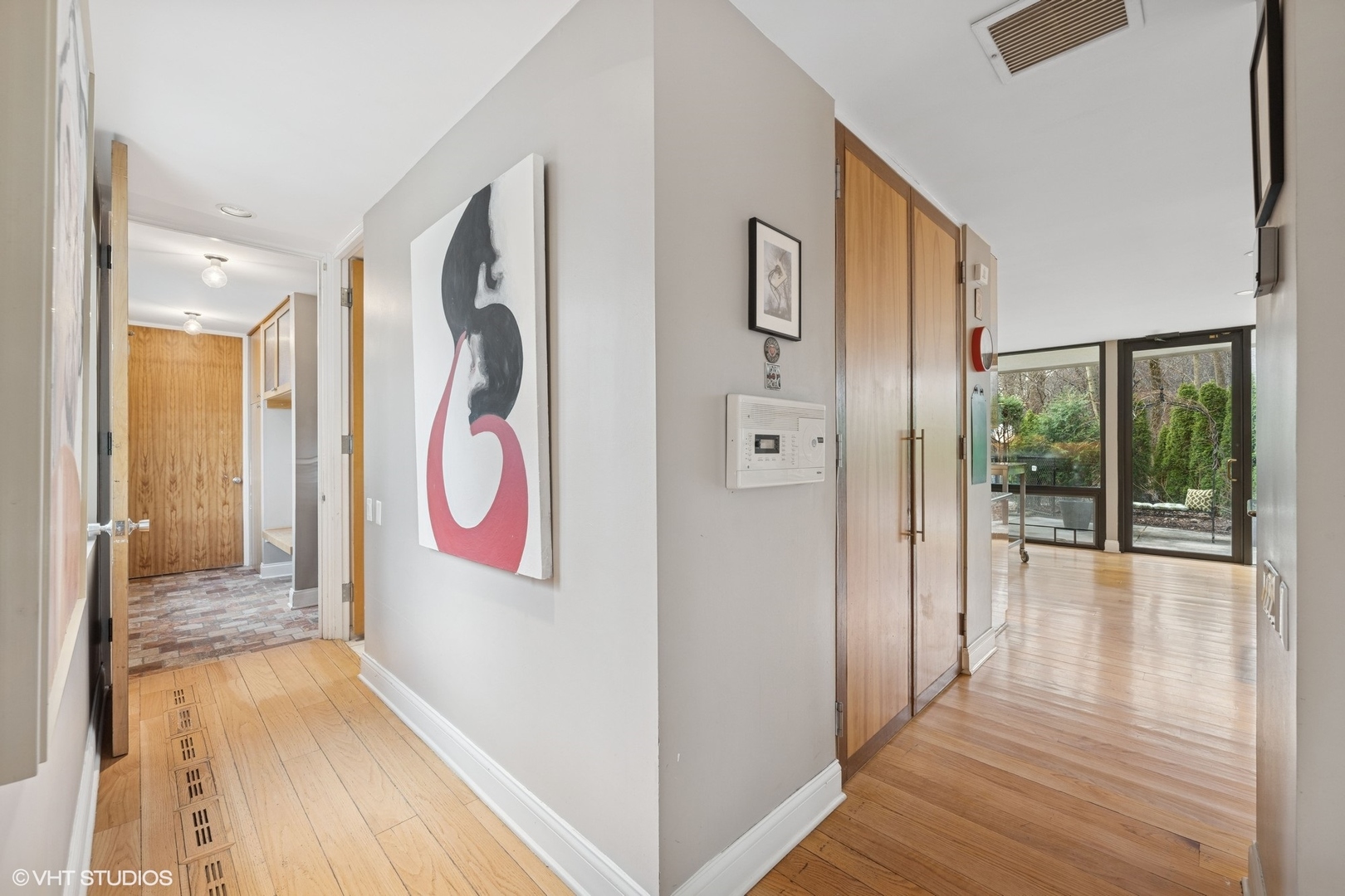 2000 Clendenin Lane Riverwoods, IL 60015 - Photo 8 of 51 a view of a hallway with wooden floor and door