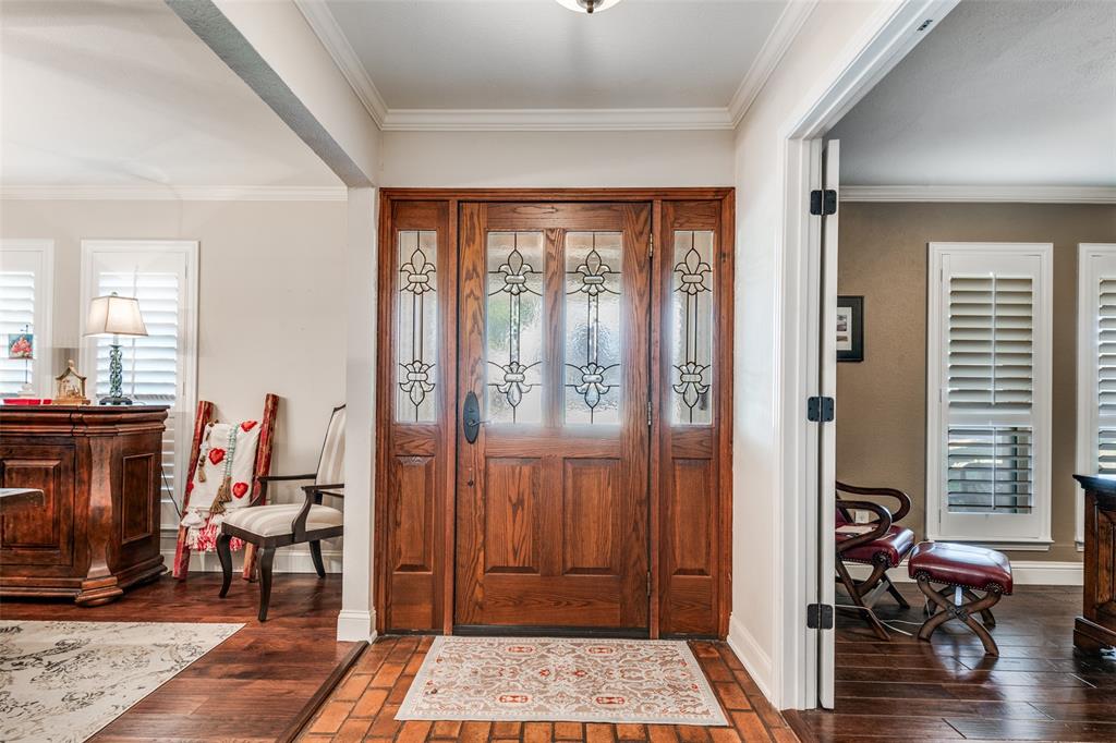 3946 Candlenut Lane Dallas, TX 75244 - Photo 4 of 25 a view of a livingroom with furniture and a window