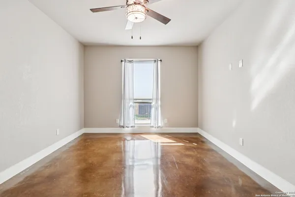 an empty room with a window